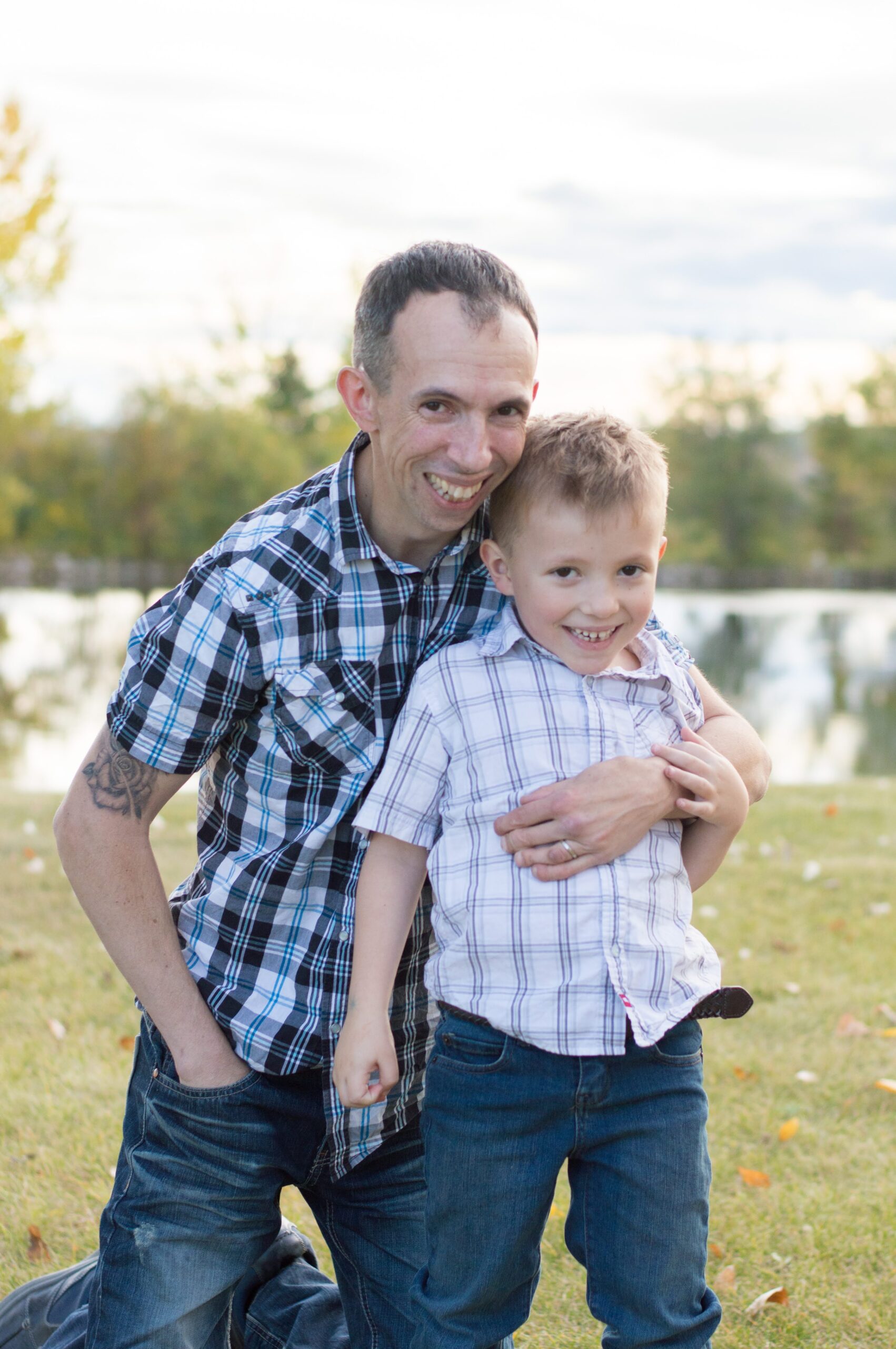 Thomas Cheesman with his child by the water