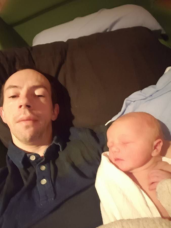 Thomas Cheesman camping with his child